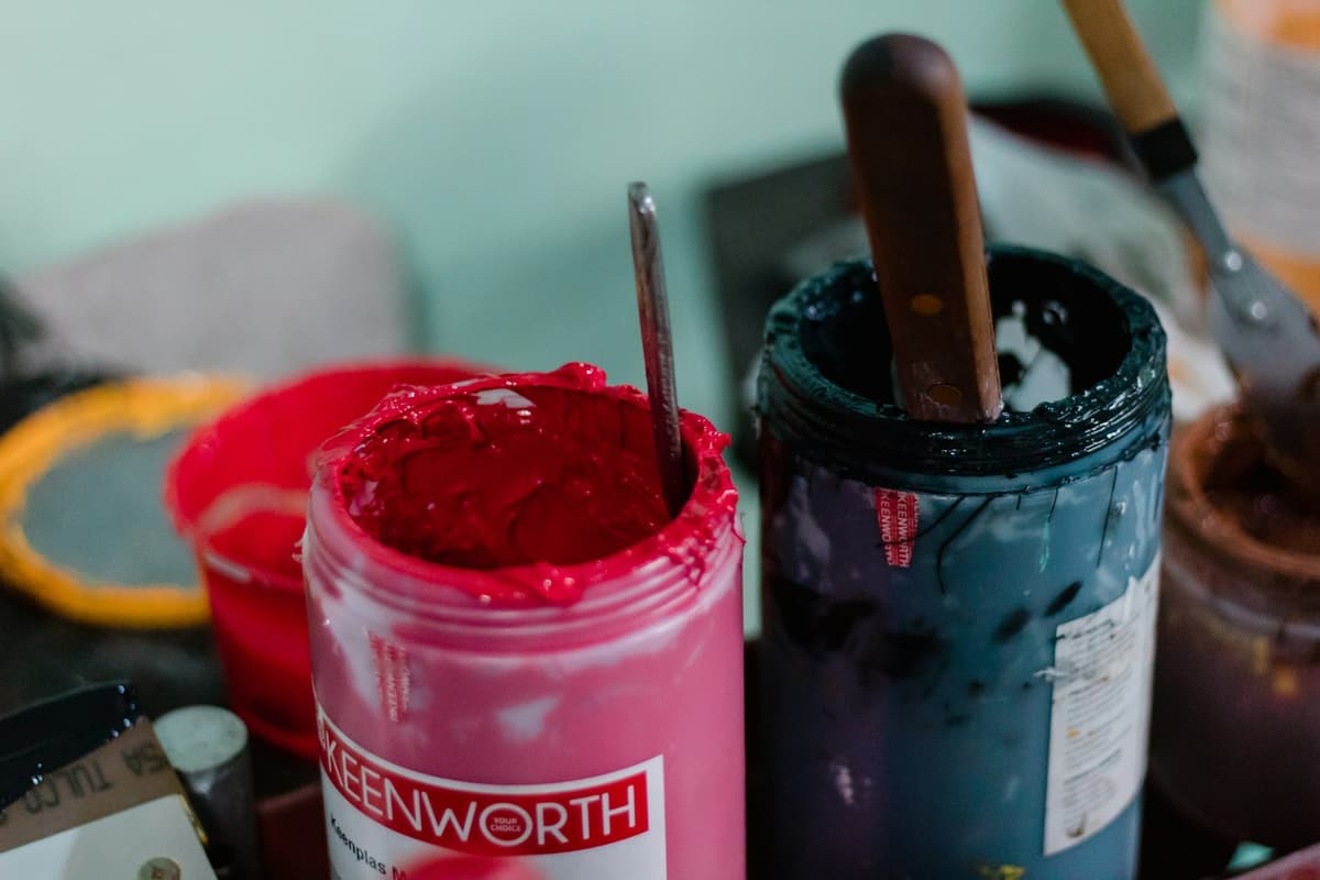 Jars of screen printing ink on the production floor