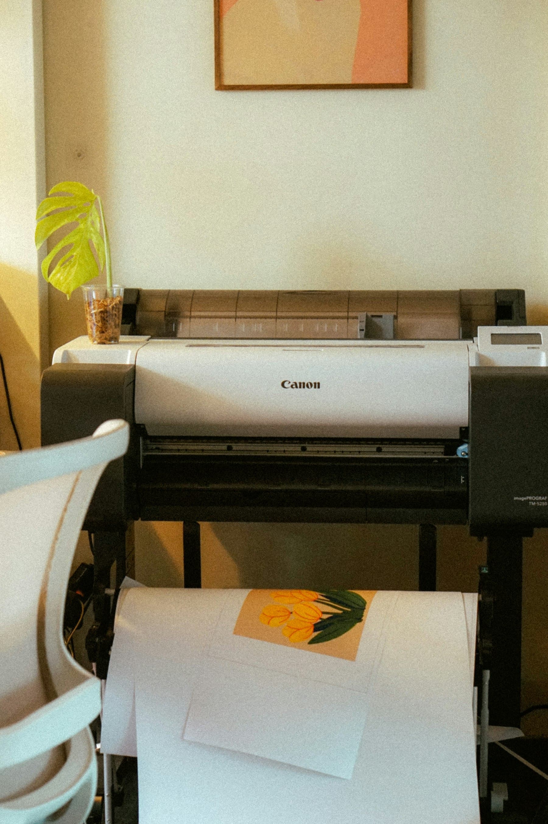 Large format printer producing a full-color banner