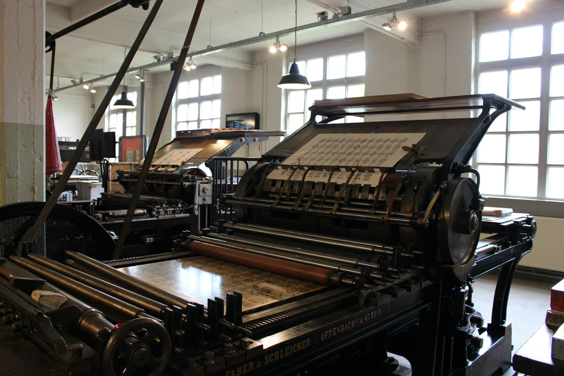 Screen printing carousel press inside the workshop